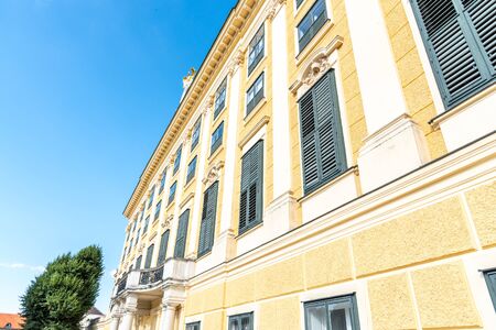 VIENNA, AUSTRIA - 23 JULY, 2019: Schonbrunn Palace - German: Schloss Schonbrunn. Architectural detail of yellow facadeのeditorial素材