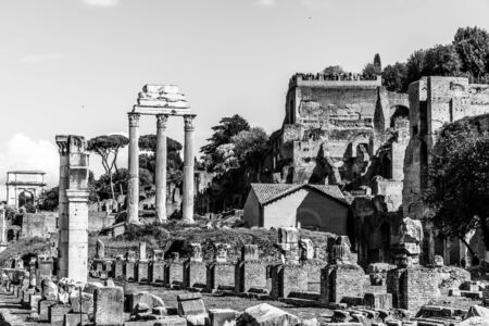 Ancient ruins of Basilica Julia and Temple of Castor and Pollux in Roman Forum, Rome, Italy. Black and white image.の写真素材