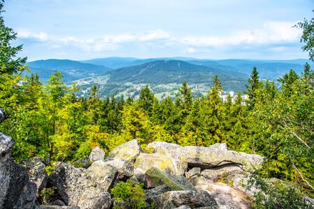 Scenic view of Tanvaldsky Spicak from rocky summit of Muchov Hill, Jizera Mountains, Czech Republic.の写真素材