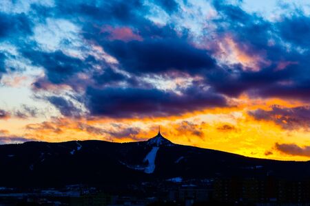 Silhouette of Jested mountain at sunset time, Liberec, Czech Republic.の写真素材
