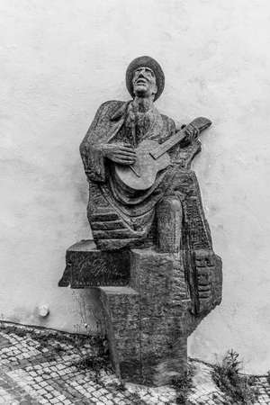 PRAGUE, CZECH REPUBLIC - MAY 26, 2020: Statue of Czech musician Karel Hasler at Old Castle Stairs, Prague Castle, Prague, Czech Republic. Black and white image.のeditorial素材