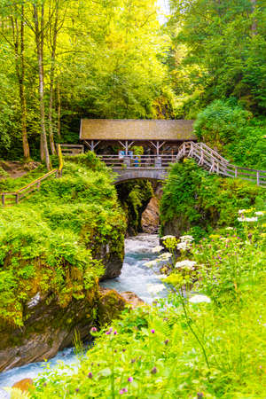 Entrance Bridge to Sigmund Thun Gorge. Cascade valley of wild Kapruner Ache near Kaprun, Austria.の写真素材