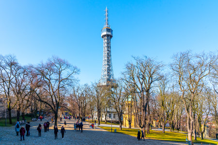 PRAGUE, CZECH REPUBLIC - FEBRUARY 08, 2020: People at Petrin lookout tower in Prague on sunny winter day. Prague, Czech Republic.のeditorial素材