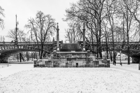 Historical staircase of Legion Bridge on Strelecky Island in Prague, Czech Republic. Winter photography. Black and white image.の写真素材