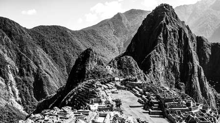 Machu Picchu, peruvian lost city of Incas situated on mountain ridge above Sacred Valley of Urubamba River in Cusco Region, Peru.の写真素材