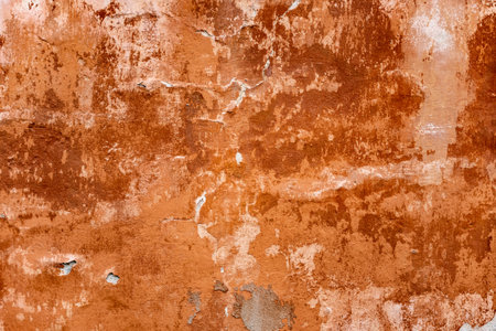Vintage red-brown grunge facade background.の写真素材