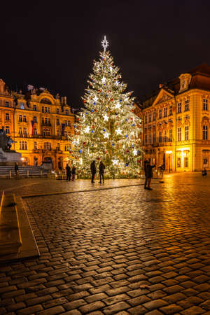 PRAGUE, CZECH REPUBLIC - DECEMBER 21, 2020: Christmas time in Prague. Decorated Christmas tree on Old Town Square, Czech: Staromestske namesti, Prague, Czech Republicのeditorial素材