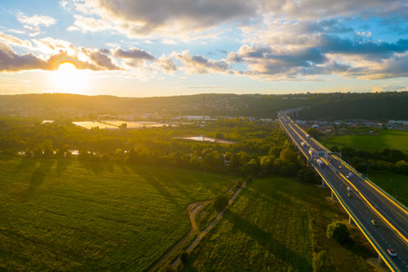 Traffic on highway bridge on sunny summer eveningの写真素材