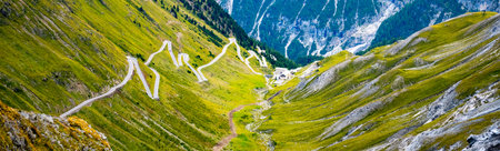 Serpentines of alpine mountain road to Stelvio Pass, Italian: Passo dello Stelvio, South Tyrol, Italian Alps, Italyの写真素材