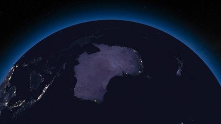 Earth globe by night focused on Australia. Dark side of Earth with illuminated cities and stars of universe on background.の写真素材