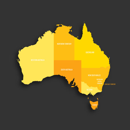 Australia political map of administrative divisions - states and teritorries. Yellow shade flat vector map with name labels and dropped shadow isolated on dark grey background.のイラスト素材