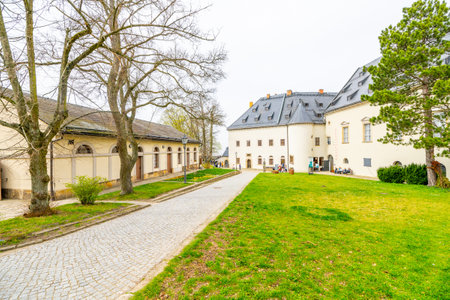The Konigstein Fortress, a monumental structure in Saxony, Germany, showcases its impressive architecture and beautiful surroundings, inviting visitors to explore its rich history and scenic views.の写真素材