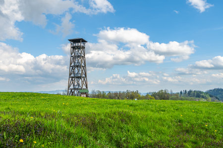 Eliska lookout tower stands tall near Zacler in Giant Mountains, offering visitors stunning views of...