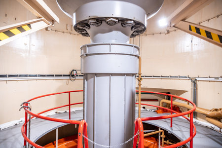 Inside the Orlik Hydroelectric Power Station in Czechia, a large Kaplan turbine is prominently...
