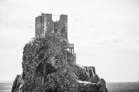 Baba Tower stands majestically on a rocky outcrop in the Bohemian Paradise. Surrounded by stunning landscapes, it invites exploration and offers panoramic views of the region.の写真素材