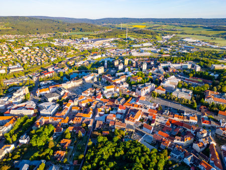 An aerial overview of Pribram illustrates the blend of urban development and surrounding greenery.の写真素材