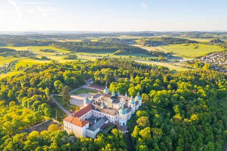 Holy Mountain in Pribram stands majestically, surrounded by lush greenery in spring. This Baroque complex attracts pilgrims seeking spiritual solace and stunning views of the countryside.の写真素材