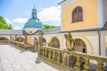 Visitors explore the beautiful Baroque complex on Holy Mountain in Pribram, Czechia. This site serves as a significant pilgrimage destination with stunning architecture and serene surroundings.の写真素材