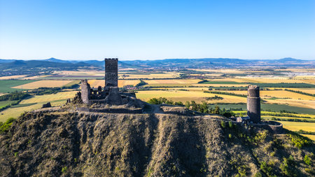 Nestled in the Central Bohemian Uplands, Hazmburk Castle ruins offer stunning aerial views of the surrounding landscape in Czechia, reflecting the grandeur of its medieval past.の写真素材