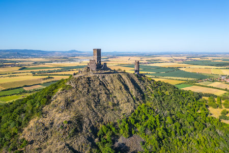 Hazmburk Castle ruins stand majestically atop a hill in Czechia.の写真素材
