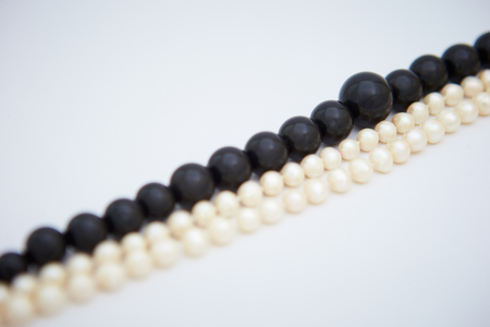 black and white necklace on a white backgroundの写真素材