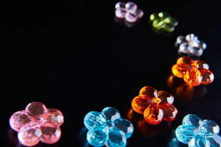 costume jewelry on black background, reflectionの写真素材