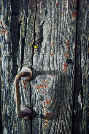 old door handle and old wooden doorの写真素材