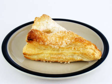 A fruit turnover on a plate.の写真素材