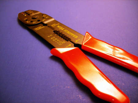 A red handled wire stripping tool.の写真素材