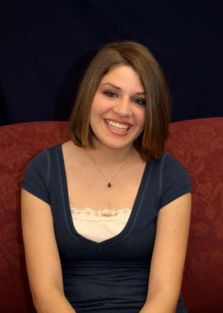 A pretty teenager with brunette hair.の写真素材