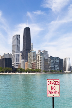 Chicago skyline with no swimming area signの写真素材