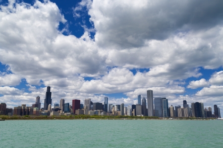 Chicago city skyline by the lake with dramatic cloudsの写真素材