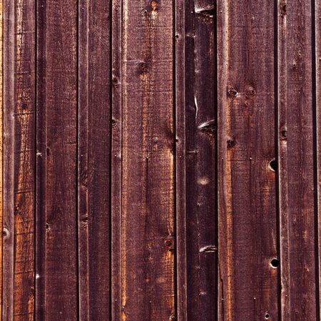 purple wooden board wall background close upの写真素材