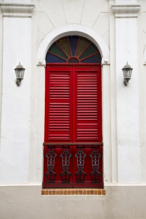 charming old Spanish balcony door with stained glass in San Juan, Puerto Ricoの写真素材