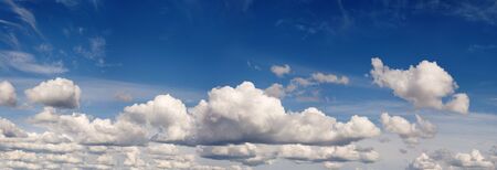 Panorama of the blue cloudy years skyの写真素材