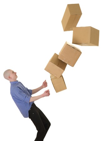 Man drops boxes on a white backgroundの写真素材
