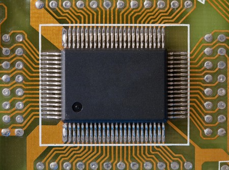 Microphoto of an integrated microcircuit of black colourの写真素材