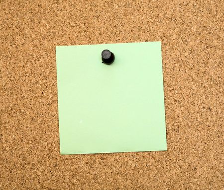 Stickers pinned to a brown cork boardの写真素材