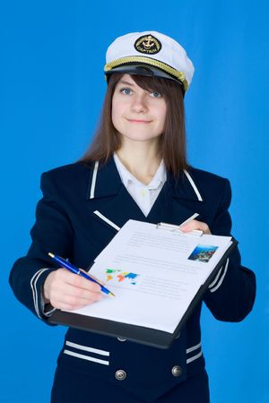 Girl in sea uniform with tablet and penの写真素材