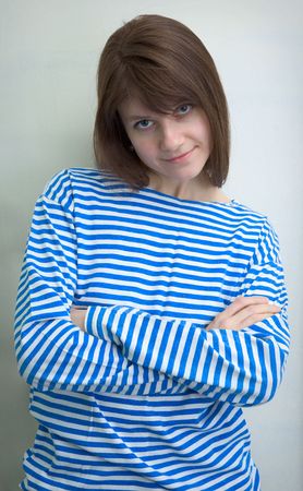 The beautiful girl in a stripped vestの写真素材