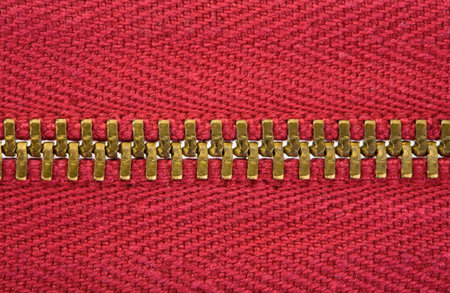 The red metal zipper on close upの写真素材