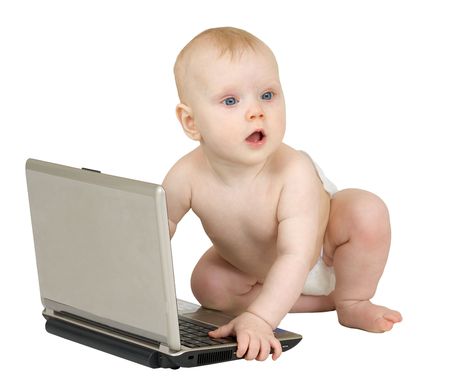 Baby with the laptop on a white backgroundの写真素材