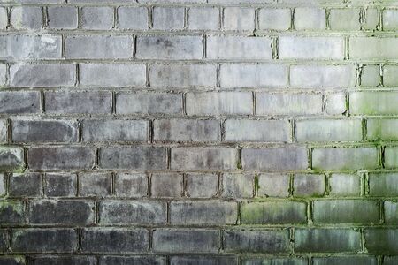 Abstract background with mustiness old grunge brick wallの写真素材