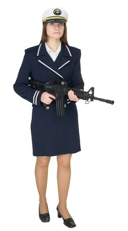 The girl in a uniform of the seaman with a rifle in hands isolated on white backgroundの写真素材