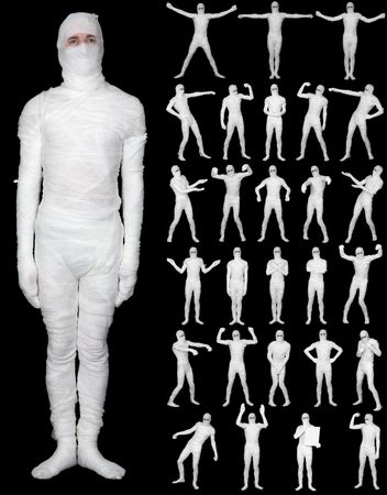 Collection of the terrible bandaged mummies isolated on a black backgroundの写真素材