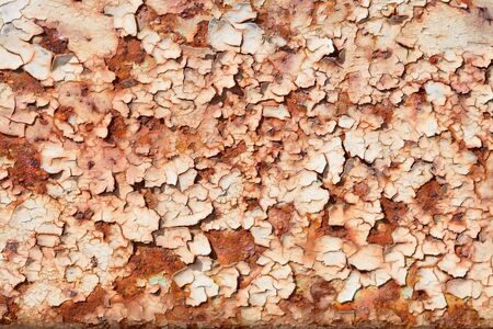 Surface of rusty steel sheet with the peeled paint and corrosion stainsの写真素材