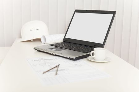 Office workplace of the engineer - the designer with the laptopの写真素材
