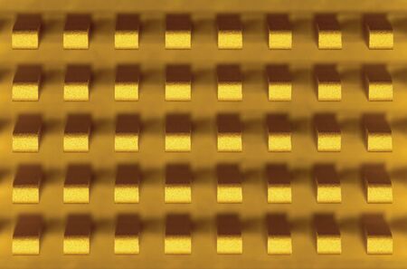 Macro-photo of a small golden metal radiatorの写真素材