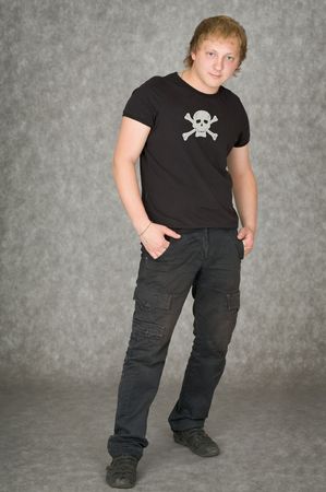 The man in a T-shirt with pirate symbolicsの写真素材