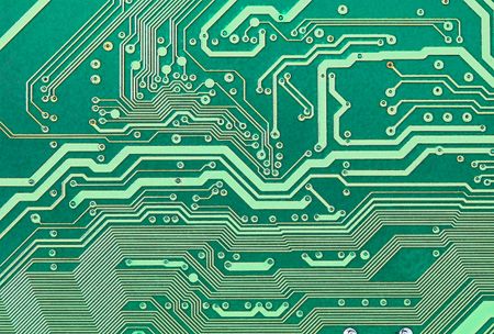 Texture of an electronic plate of green color with metallic pathsの写真素材